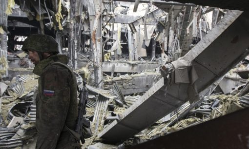An armed man with the separatist self-proclaimed Donetsk People's Republic army stands in the destroyed terminal of Donetsk airport. March 3, 2015. REUTERS/Baz Ratner (UKRAINE - Tags: POLITICS CIVIL UNREST CONFLICT) An armed man with the separatist self-proclaimed Donetsk People's Republic army stands in the destroyed terminal of Donetsk airport. March 3, 2015. REUTERS/Baz Ratner (UKRAINE - Tags: POLITICS CIVIL UNREST CONFLICT)